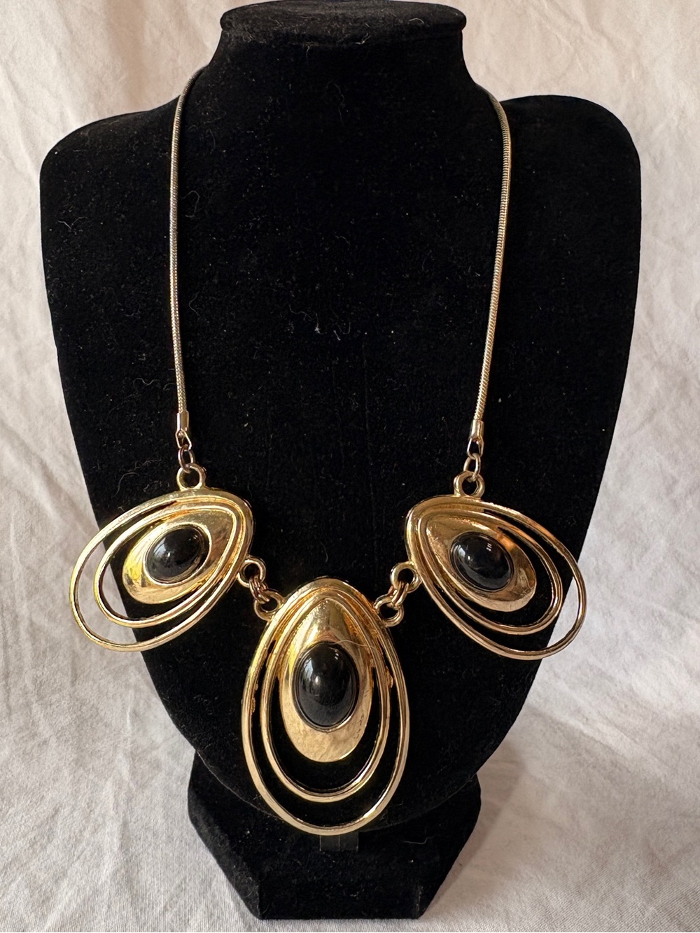 Gold-tone Statement Necklace with Black Cabochon Accents